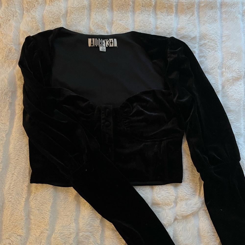 Black going out top
